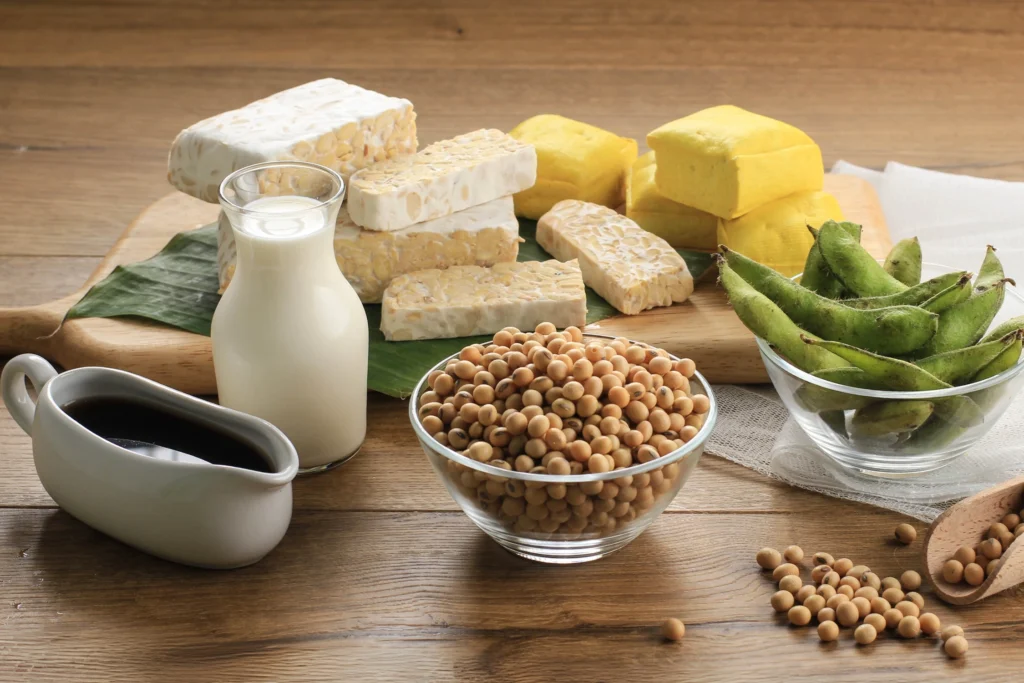 Fermented soy foods and soy-based products including tempeh, tofu, edamame, soy milk, and soybeans – natural sources of phytoestrogens that may increase estrogen and support female hormone health.